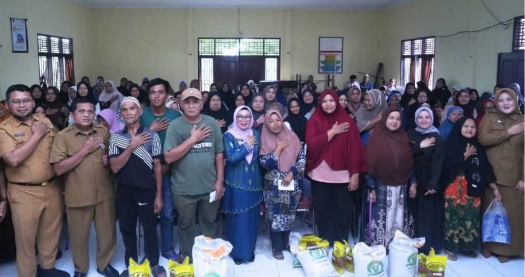 Perkuat Ketahanan Pangan, Pemkab Kampar Salurkan Bantuan Beras dan Minyak ke Desa Merangin